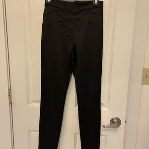 Bebe Black Zippered dress pants. These would look great with high heels.